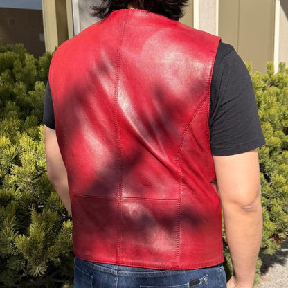 Gilet homme en cuir de mouton. Fermeture à pression et poches avant