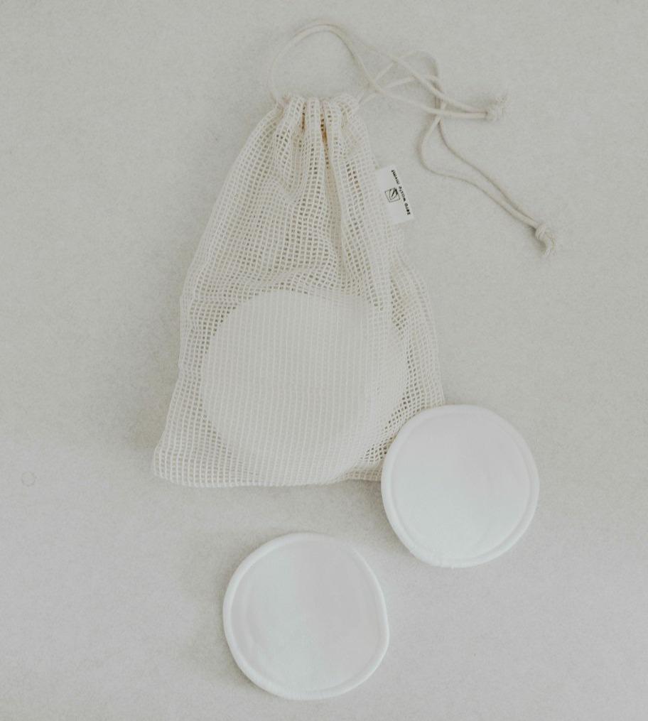 12 tampons démaquillants avec sac