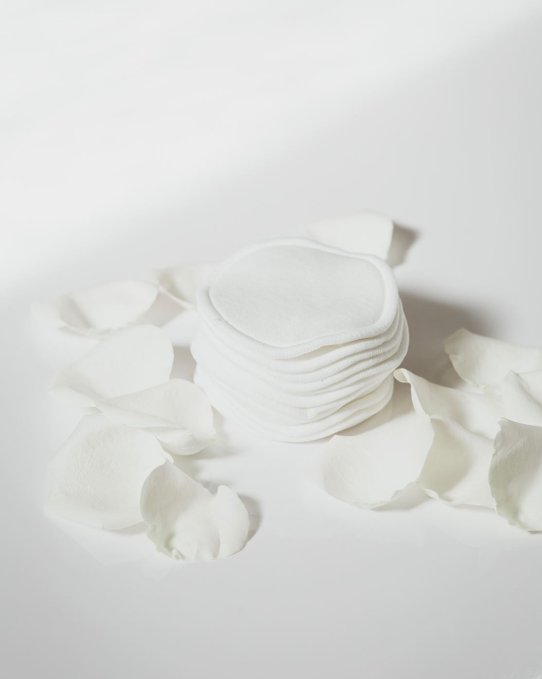 12 tampons démaquillants avec sac