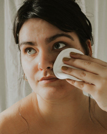12 tampons démaquillants avec sac