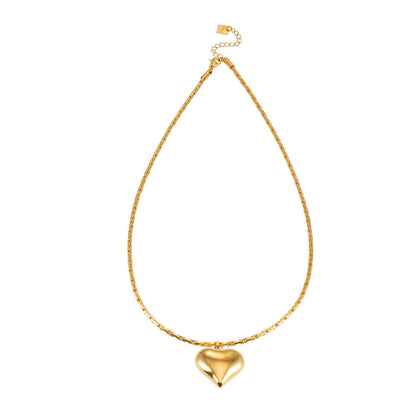 ABEL: Engineered Cable Chain with Puffy Heart Pendant in Gold.