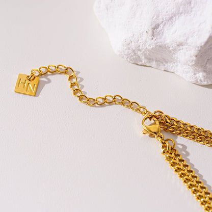 ANIMA : Collier simple à double chaîne, largeur XL et détails travaillés