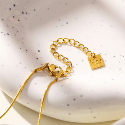 ARCASSA: Zirconia Embedded Hammered Finish Cross Pendant on a Mini Snake Skin Textured Chain Necklace.