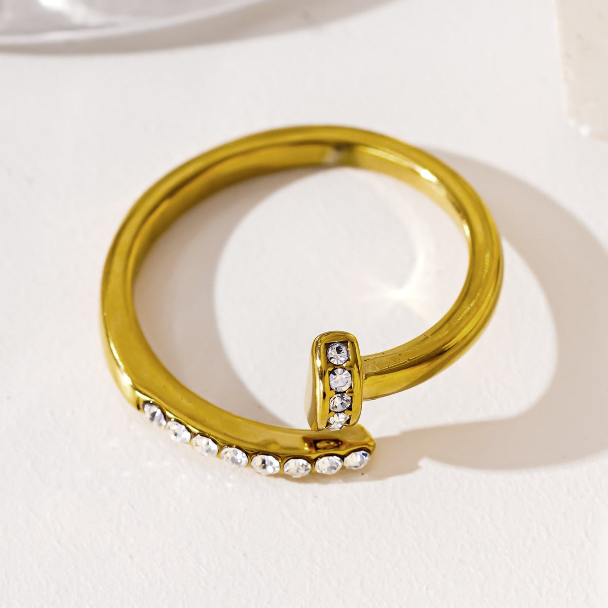 CHARISSE Gold: Industrial-Chic Twisted Nail Ring with Pavé Zirconia Embellishments