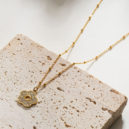 MELRINA Gold - Vintage Bloom: Beaded Chain Necklace with Pave Zirconia Flower Charm