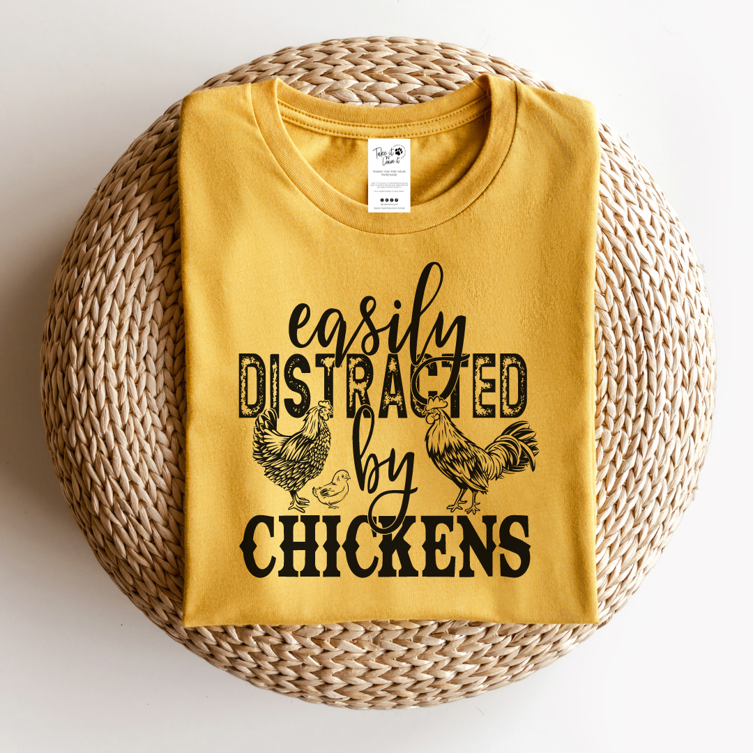 Facilement Distrait par les Poulets