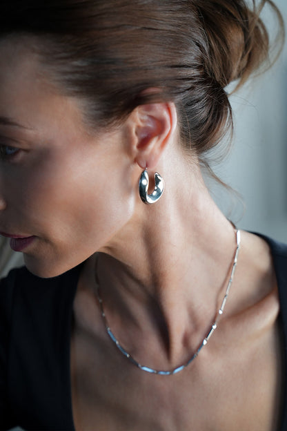 Style GALENA White Gold (Silver Toned): Twisted Hoop Style Earrings