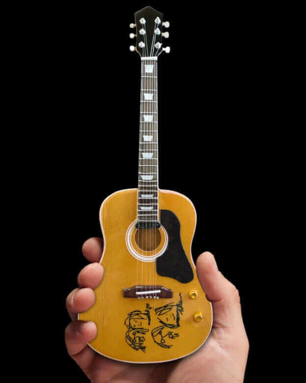 Fab Four sous licence - Réplique miniature de guitare acoustique John Lennon « Give Peace a Chance » à collectionner