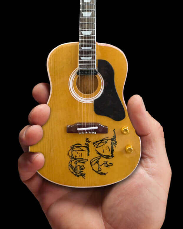 Fab Four sous licence - Réplique miniature de guitare acoustique John Lennon « Give Peace a Chance » à collectionner