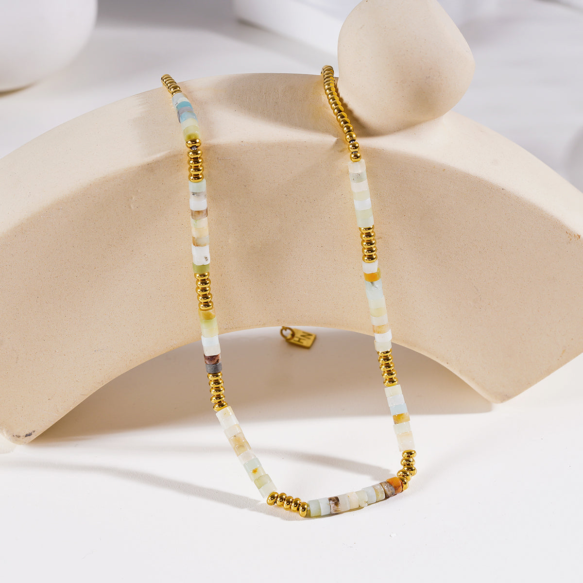 ISHANI: Pink Aventurine Stones and Gold Beaded Necklace