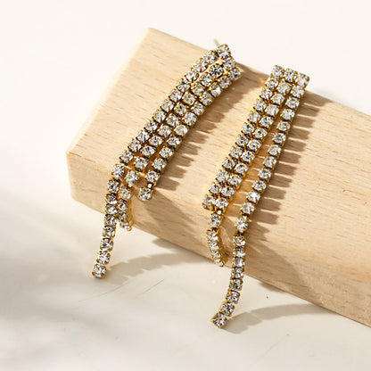 JOSEFINA: Boucles d'oreilles pendantes en zircone à trois perles