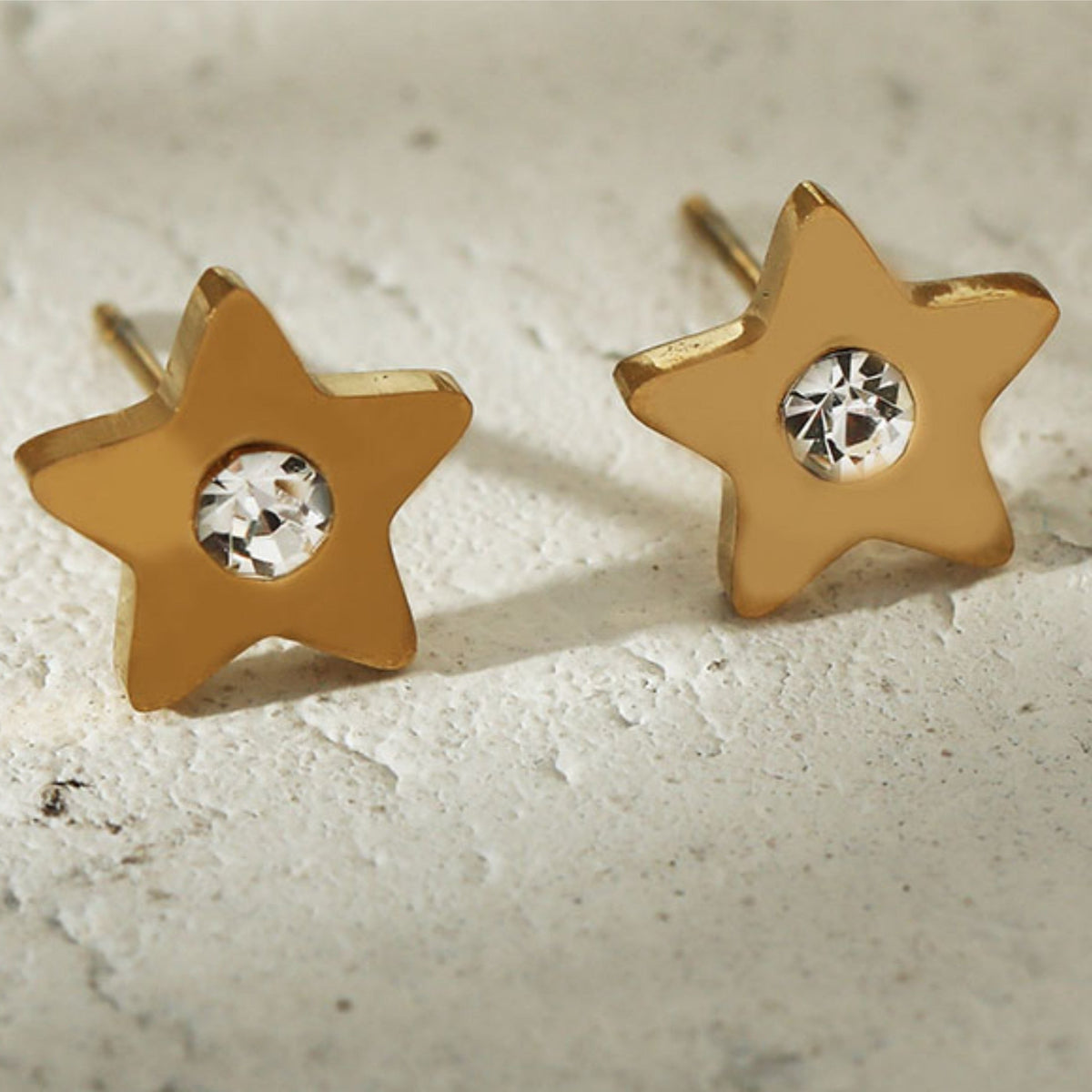 LAYLA Gold: Star Shaped Stud Earrings with a Solitaire Zirconia at Centre