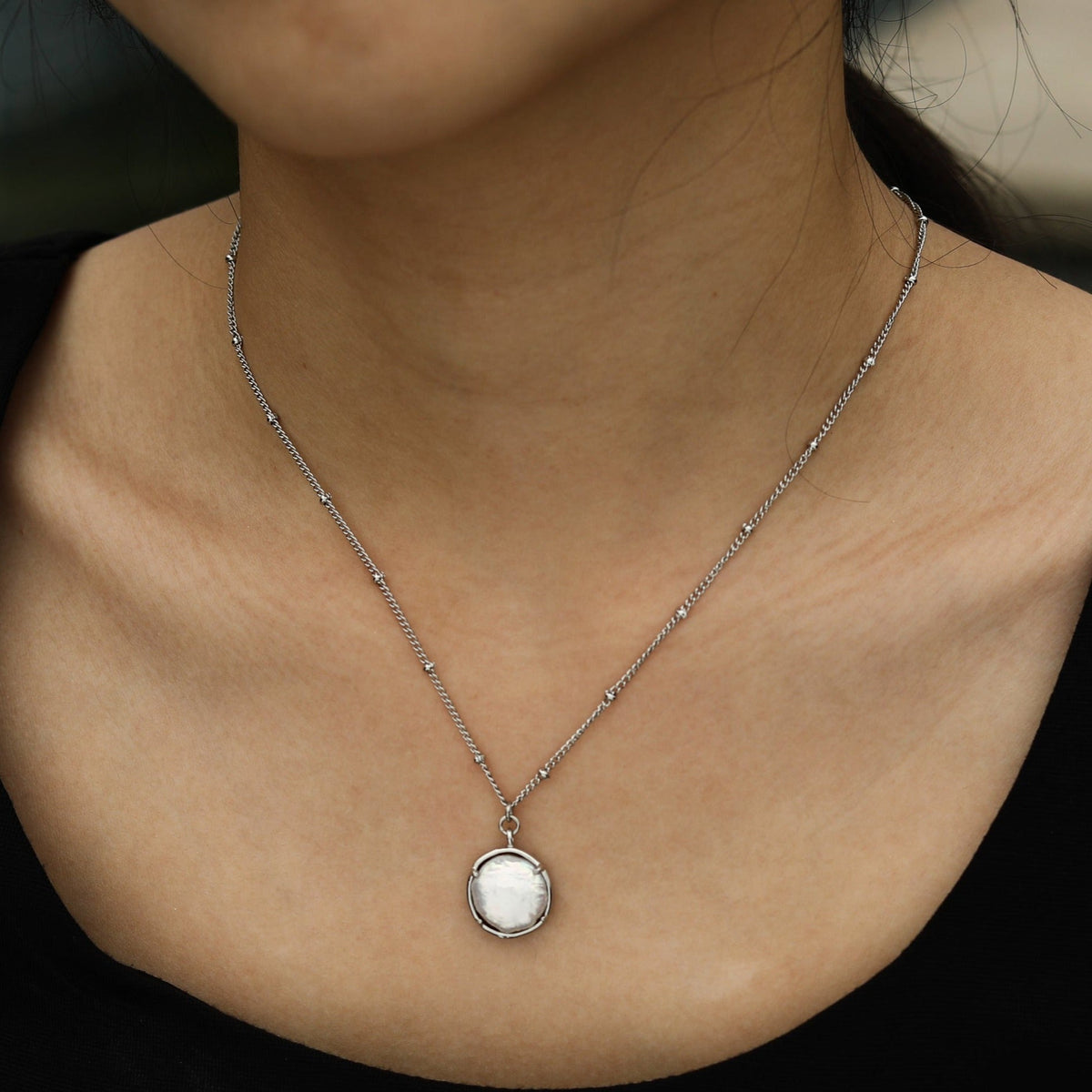 LERATI Beaded Chain with an Encased Fresh Water Pearl Pendant in Silver