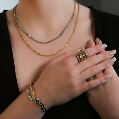 FREDRIKA : Bracelet chic géométrique abstrait en métaux mélangés