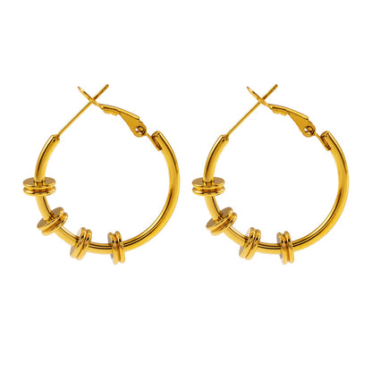 MINATO: Modernist Hoop Earrings Anchoring Industrial-Chic Double Discs.