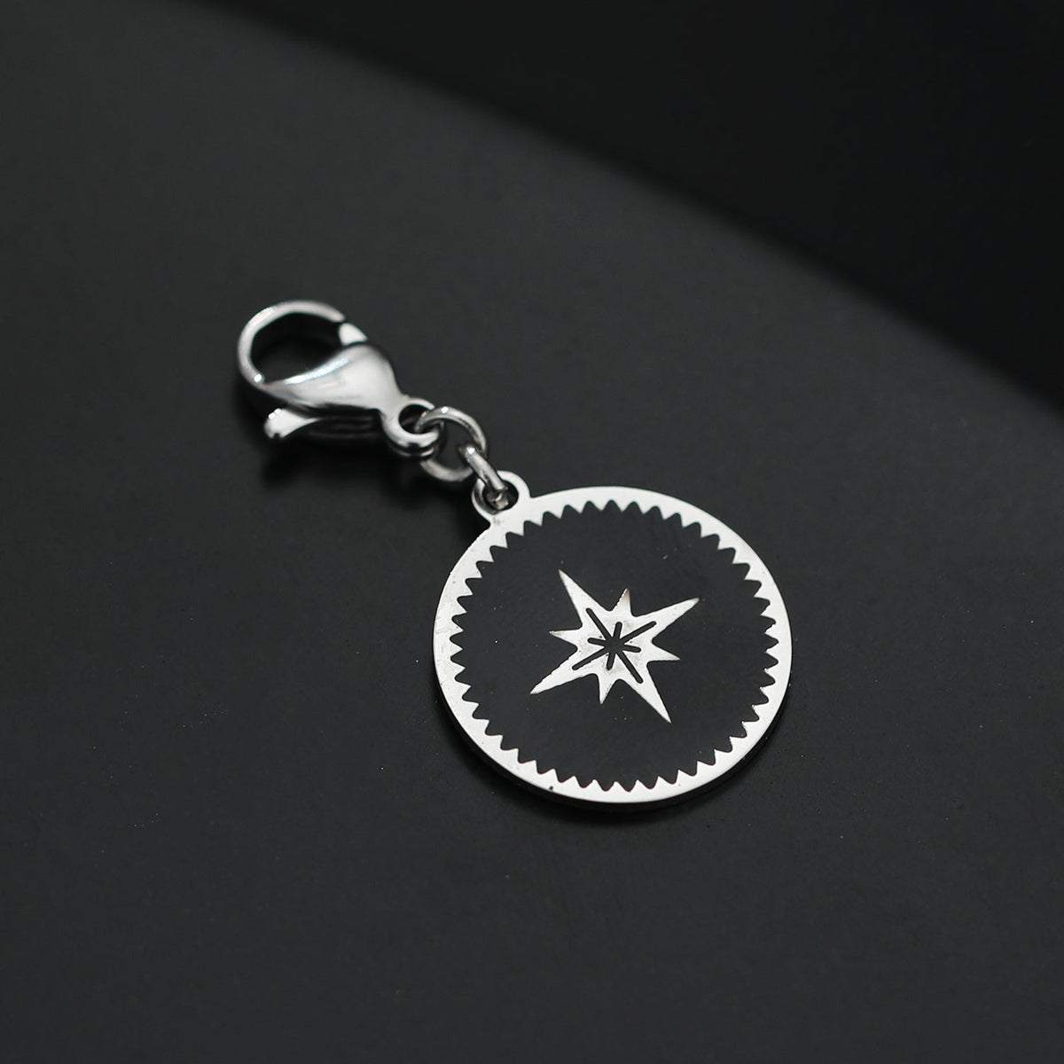 KAILA : Breloque symbole étoile argentée