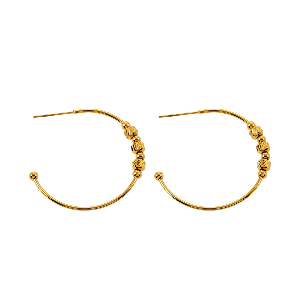 CHARIS: Classic Round Hoop Earrings Anchoring a Bevy of Charm Beads