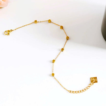 Bracelet EFFIE perles carrées dorées