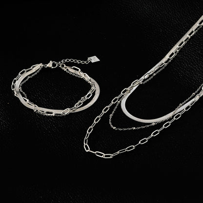 REINEDA: Triple Stacked White Gold (Silver Toned) Bracelet