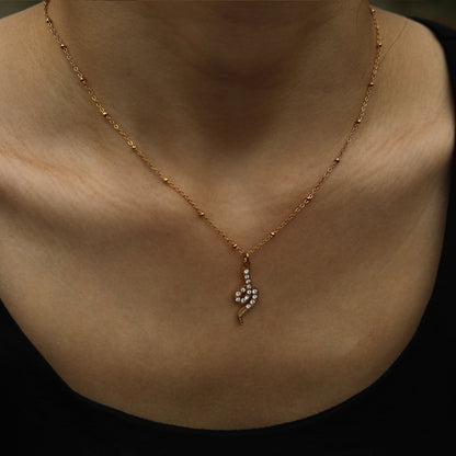 RIHANNA Beaded Chain Necklace with a Pavé Zirconia Serpent Pendant in Gold
