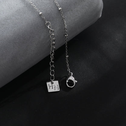 RIHANNA Beaded Chain Necklace with a Pavé Zirconia Serpent Pendant in Silver