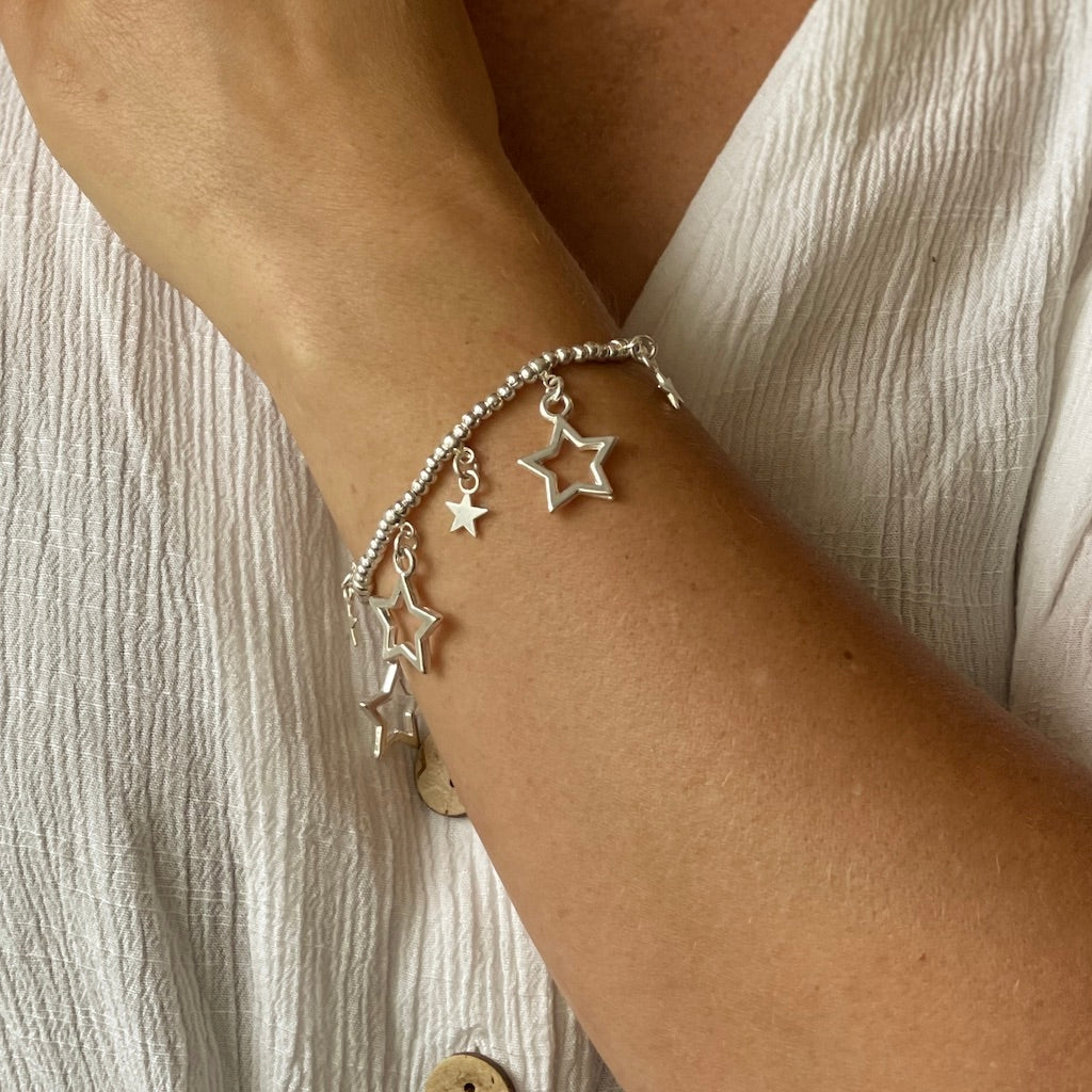 Bracelet extensible avec breloque étoile en plaqué argent