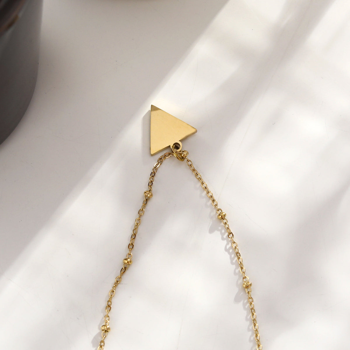 URIKA Beaded Chain Necklace with  Zirconia Pavé Triangle Pendant in Gold