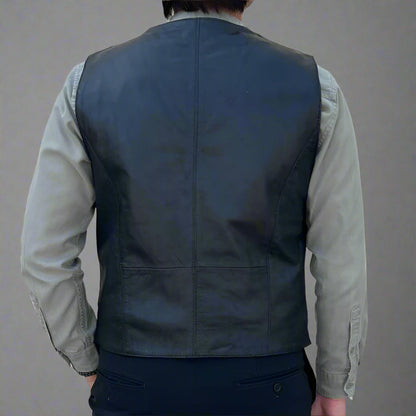 Gilet homme en cuir de mouton. Fermeture à pression et poches avant